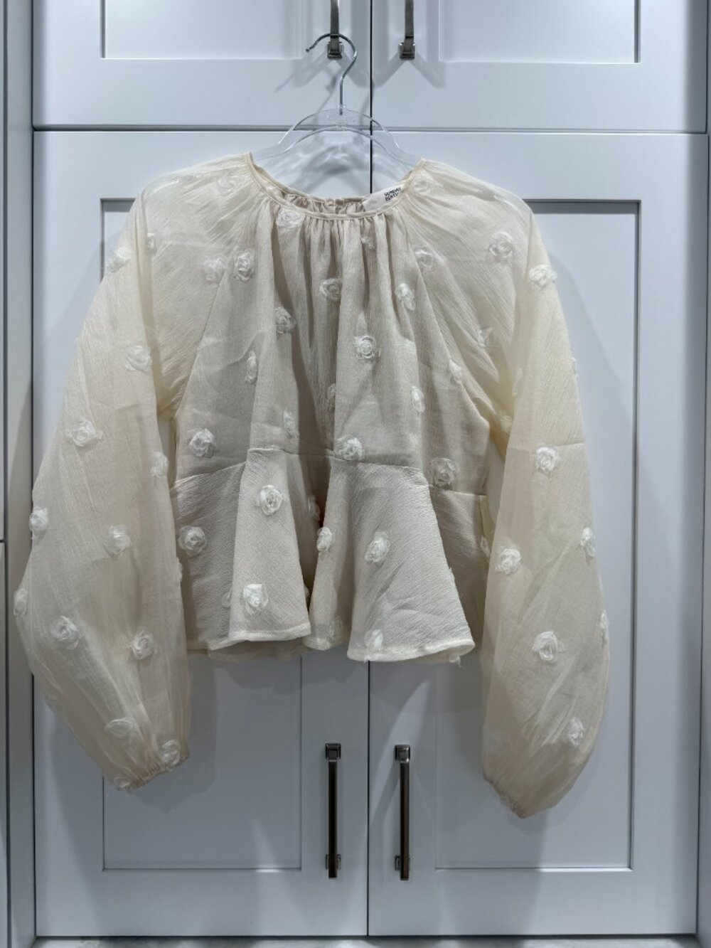 Cream Rosette Peplum Blouse – Size Medium 